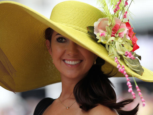 A fan looks on wearing her derby hat during the 137th Kentucky Derby at Churchill Downs on May 7, 2011, in Louisville, Ky.  