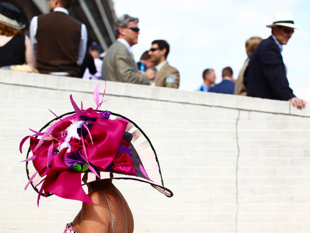 Patty Ethington of Louisville, Ky., strolls through the grandstand at Churchill Downs on the afternoon of the Kentucky Derby on May 7, 2011.  