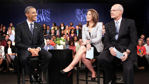 President Barack Obama visits with CBS News correspondent Harry Smith and "Early Show" co-anchor Erica Hill. during a break at a CBS News Town Hall Meeting on the economy at the Newseum in Washington, Wednesday, May 11, 2011. (AP Photo/Carolyn Kaster) 