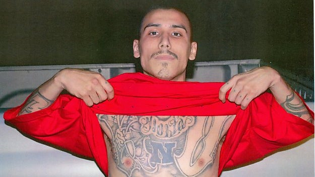 Slaying suspect may be posing as twin brother 