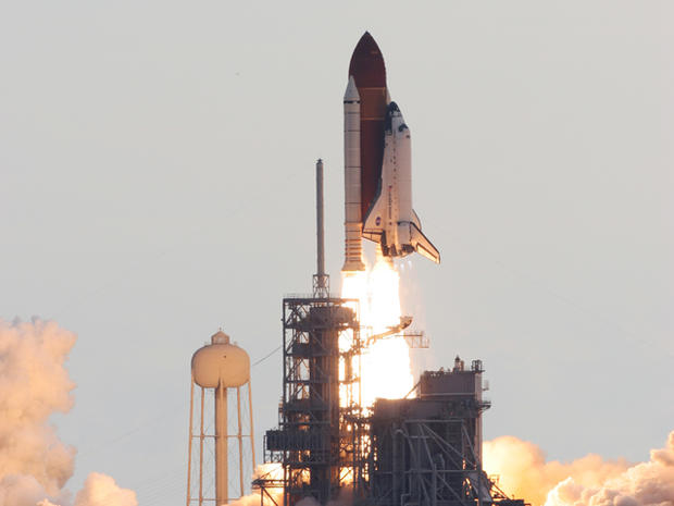 The space shuttle Endeavour lifts off from Kennedy Space Center 