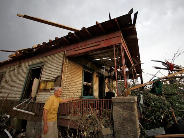 Don Atteberry surveys damage at his home 