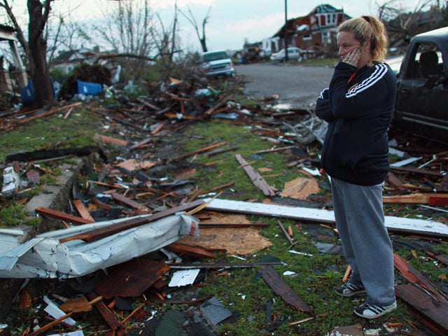 Carra Reed looks at a friend's home 