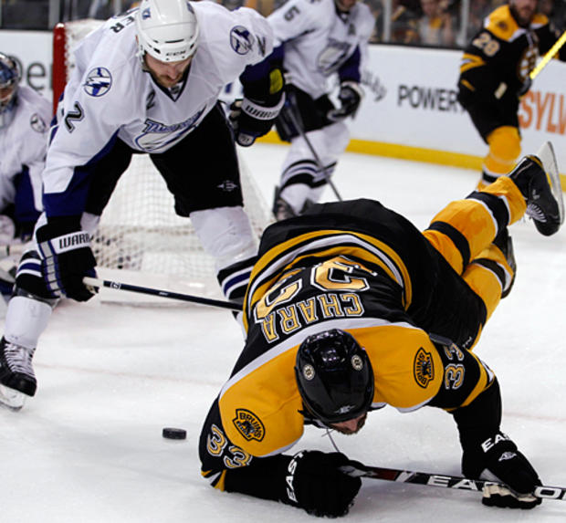 Zdeno Chara goes down to the ice 
