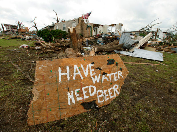 A sign is seen in a devastated neighborhood in Joplin 