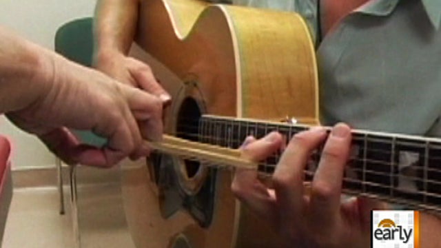 es_0527_GUITARIST.jpg 