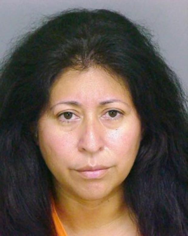 Calif. woman seen pushing body parts in trash can 