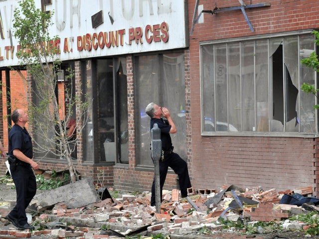 police officers call into buildings 