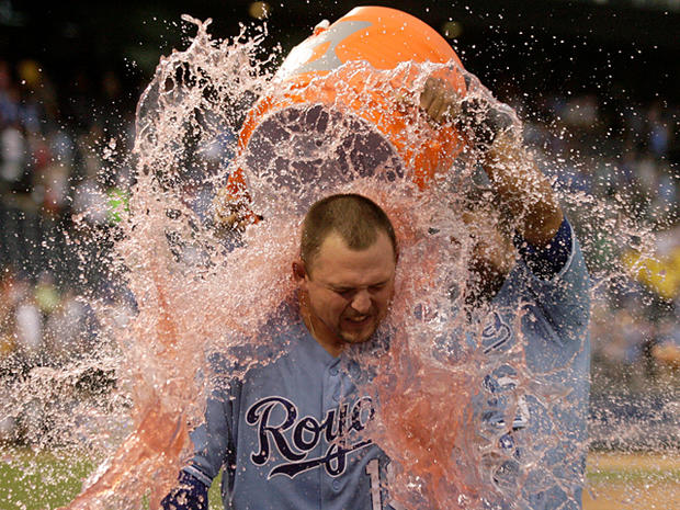 Billy Butler is doused by Melky Cabrera  