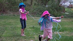 young_girls_playing_with_silly_string.jpg 