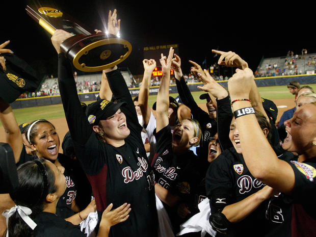 Dallas Escobedo holds the 2011 Division I National Championship trophy 