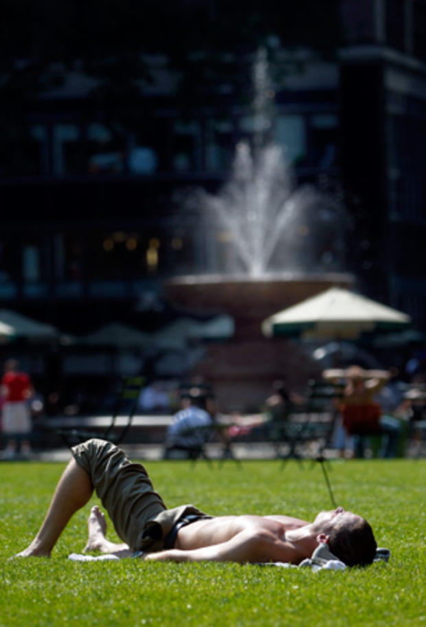 sunbather basks in Bryant Park 