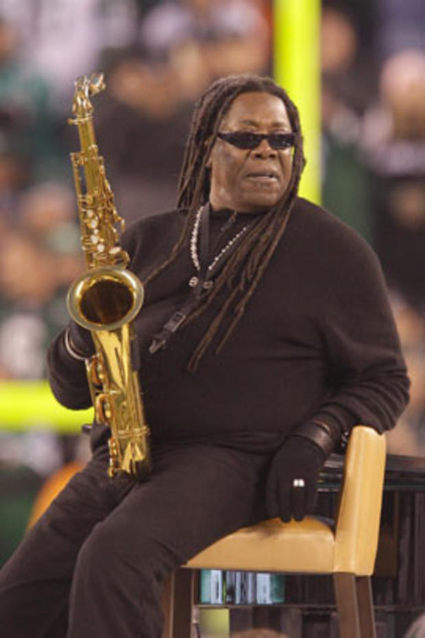 Saxophonist Clarence Clemons performs the National Anthem before an NFL football game between the Miami Dolphins and the New York Jets on Dec. 12, 2010.. 