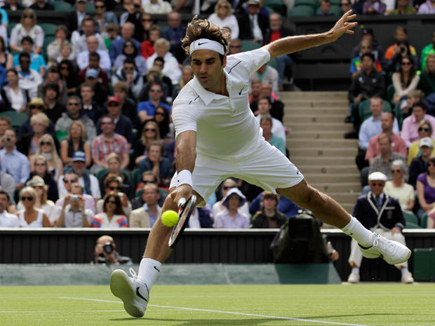 Roger Federer returns a shot 