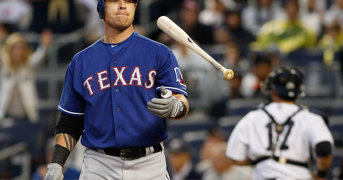 Texas Rangers' Josh Hamilton loses his bat during the sixth inning of Game  5 of baseball's