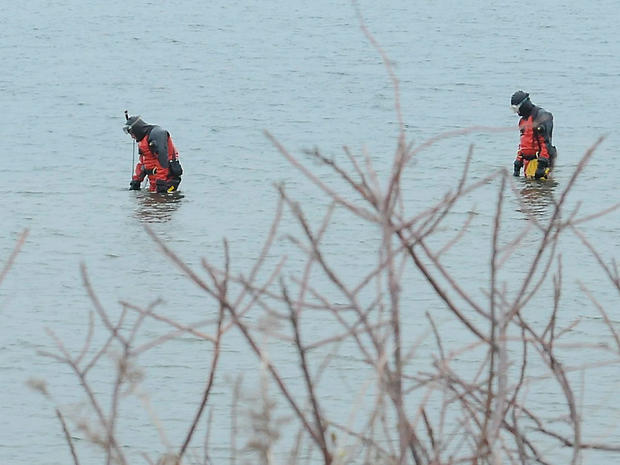 Suffolk County divers conduct a water search in Hemlock Cove between Cedar and Gilgo Beach. 