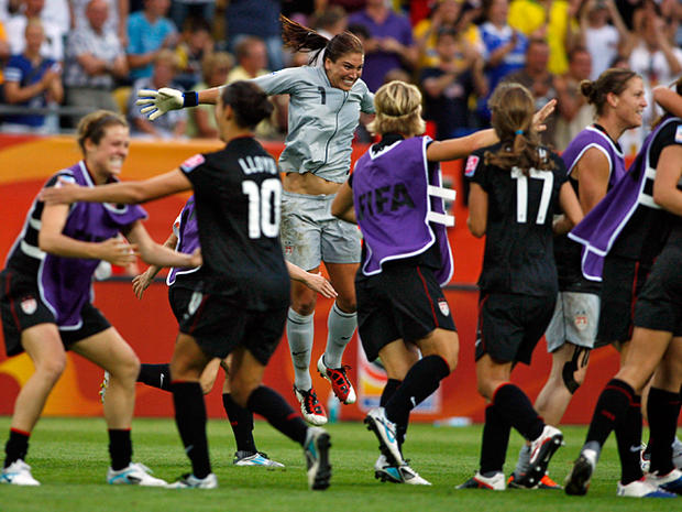 Hope Solo jumps in celebration 
