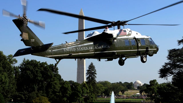 The Marine One helicopter carrying President Obama takes off from the South Lawn of the White House in Washington July 1, 2011, for Camp David, Md. The Washington Monument is at left, and the Jefferson Memorial is at center. 