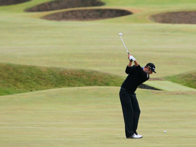 Dustin Johnson of the US plays a shot 