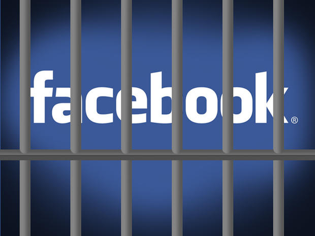 Facebook logo behind prison bars 