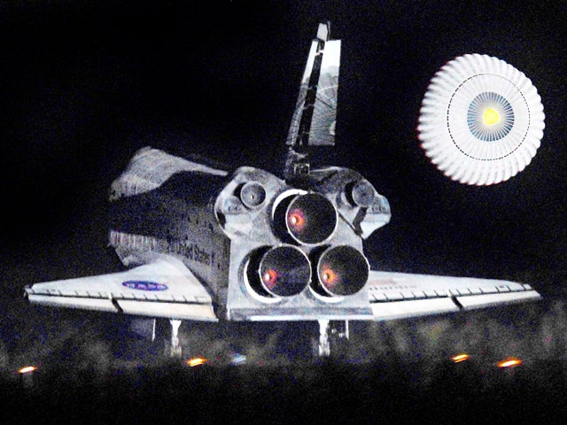 Space Shuttle Atlantis lands at the Kennedy Space Center at Cape Canaveral, Fla., July 21, 2011. The landing of Atlantis marks the end of NASA's 30-year-long space shuttle program. 