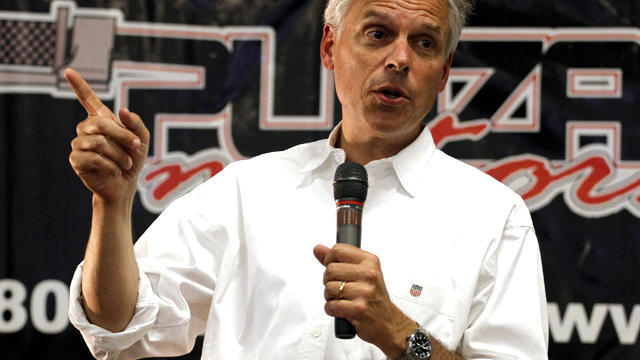 Republican presidential candidate Jon Huntsman speaks at a rally in West Valley City, Utah, July 16, 2011. Huntsman rode with the group of motorcycle riders as part of a campaign stop. 