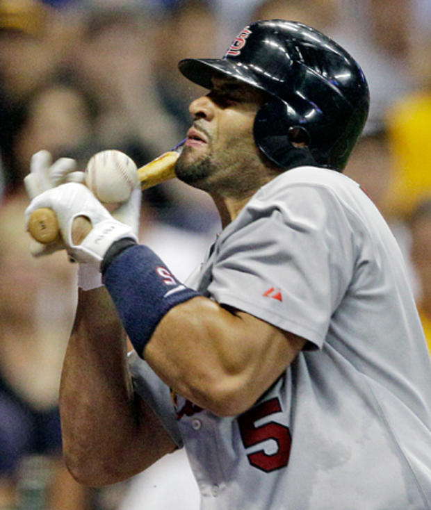 Albert Pujols is hit in the hand by a pitch 