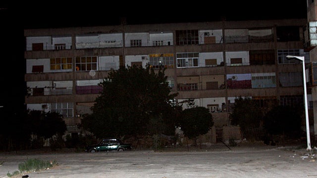 In this photo taken during a government organized tour, buildings are deserted in the central city of Hama, Syria, Sunday, Aug. 7, 2011.  