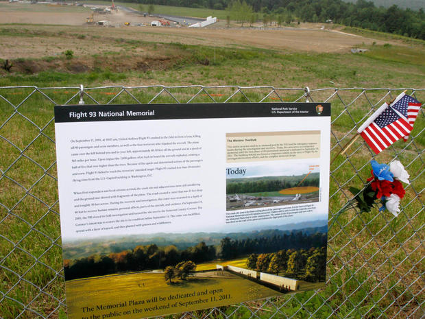 A sign describing the plan for the entire Flight 93 memorial is shown on the fence at the temporary memorial as construction continues at the Flight 93 Memorial in Shanksville, Pa. 