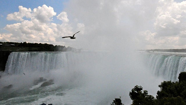 A view of Niagara Falls, specifically the Horseshoe Falls, on the Canadian side of the Niagara River. 