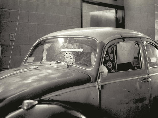 John Busby's bullet-riddled car is shown impounded at the Falmouth, Mass. police station. 
