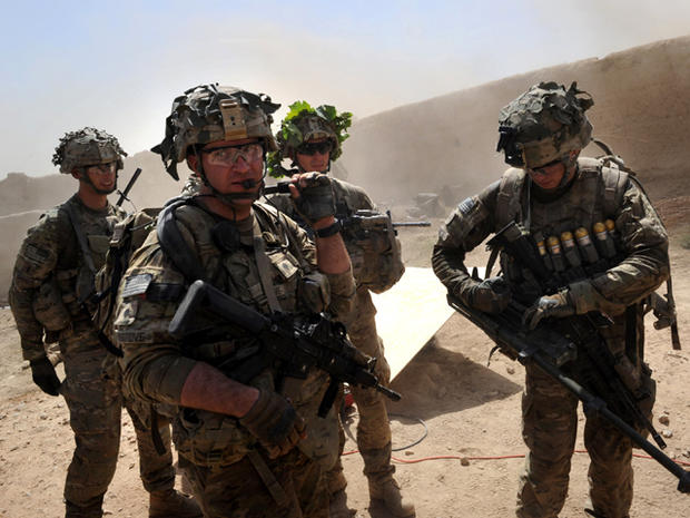 U.S. troops under Afghanistan's International Security Assistance Force patrol Kandalay village following Taliban attacks on a joint U.S. and Afghan National Army checkpoint Aug. 5, 2011. 