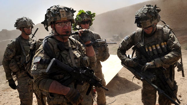U.S. troops under Afghanistan's International Security Assistance Force patrol Kandalay village following Taliban attacks on a joint U.S. and Afghan National Army checkpoint Aug. 5, 2011. 