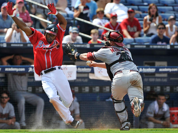 Michael Bourn is tagged out in a rundown  