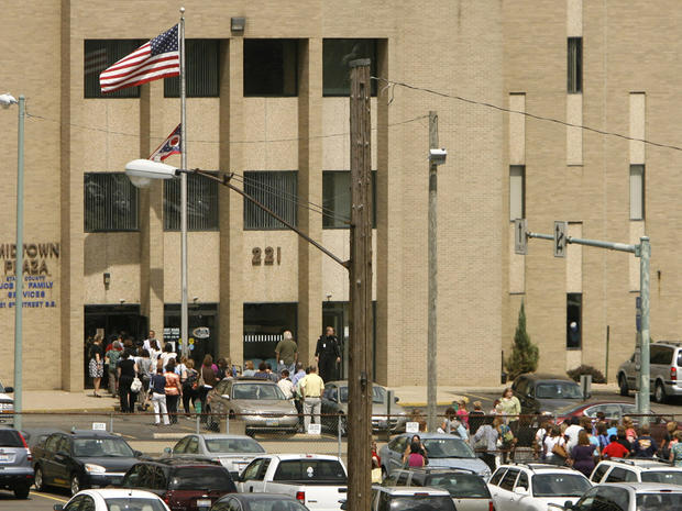 People evacuate the Midtown Plaza Stark County Jobs & Family Services building in Canton, Ohio, after feeling an earthquake  Aug. 23, 2011.  