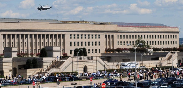 Civilians and military personnel evacuate the Pentagon in Washington after an earthquake was felt on  Aug. 23, 2011.   