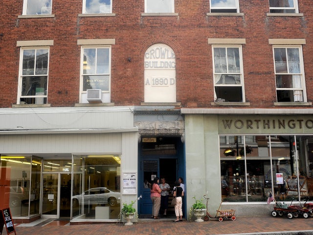 eople stand in the doorway of the Beverley Street Studio Art School after an earthquake was felt, in Staunton, Va. on  Aug. 23, 2011.  