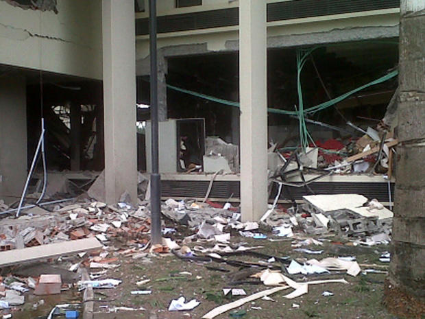 debris after a large explosion struck the United Nations' main office in Nigeria 