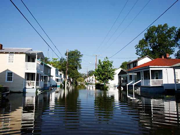 Houses are surrounded by floodwaters 