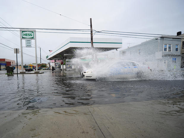 police car drives through floodwater on Coney Island  