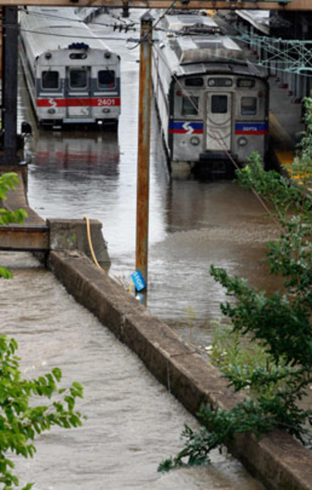 Two SEPTA trains sit on flooded tracks at Trenton train station Aug. 28, 2011, in N.J. 