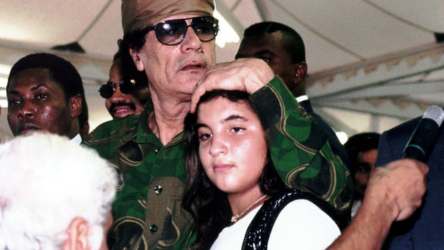 Muammar Qaddafi with his daughter Hana 
