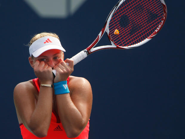 Angelique Kerber of Germany reacts after winning her match a 