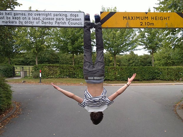 LOL-worthy "batman-ing" photos, it's the new "planking" 