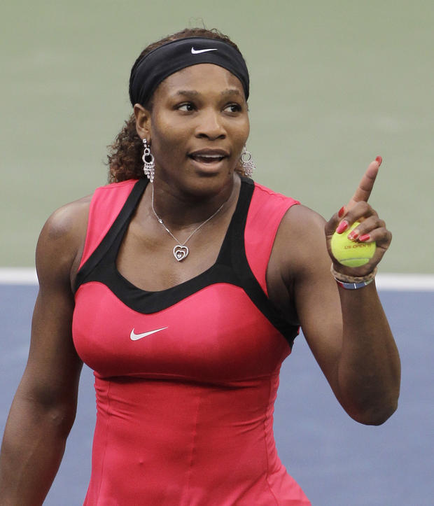 Serena Williams gestures while talking to the chair umpire Eva Asderaki during the women's championship match at the U.S. Open tennis tournament in New York, Sunday, Sept. 11, 2011.  