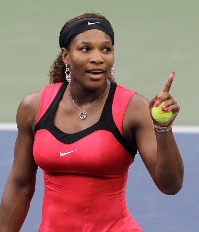 Serena Williams gestures while talking to the chair umpire Eva Asderaki during the women's championship match at the U.S. Open tennis tournament in New York, Sunday, Sept. 11, 2011.  