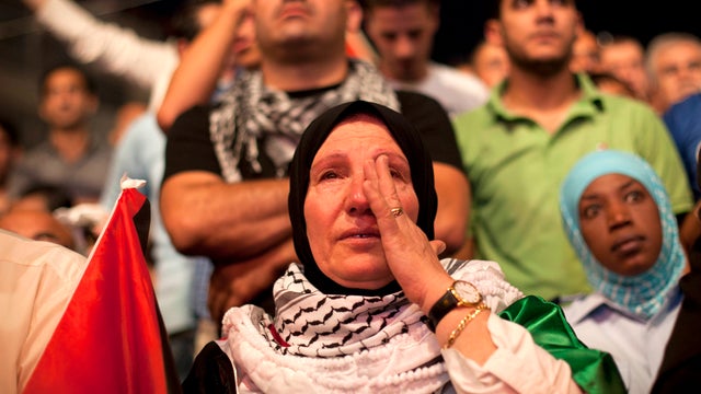 A Palestinian woman cries in the West Bank city of Ramallah as President Mahmoud Abbas addressed the General Assembly of the United Nations Sept. 23, 2011. 