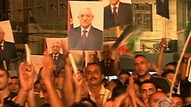 A Palestinian woman cries in the West Bank city of Ramallah as President Mahmoud Abbas addressed the General Assembly of the United Nations Sept. 23, 2011. 