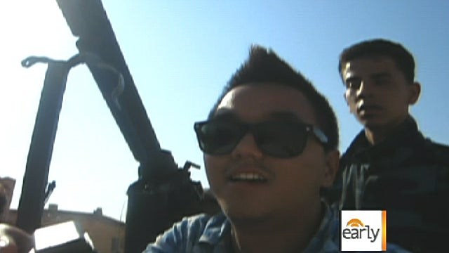 UCLA student Chris Jeon with rebels in Libya in summer of 2011 