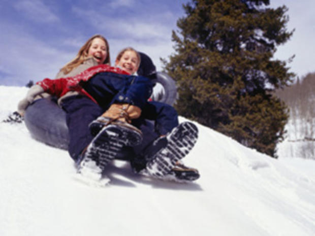 12/23/11 - A Guide to Snow Tubing in the Twin Cities Area- two girls in tube 